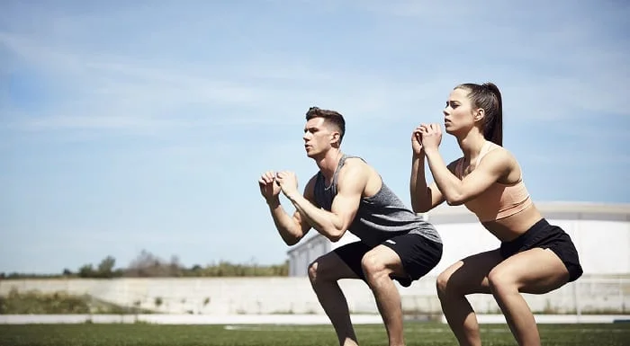 squats à deux