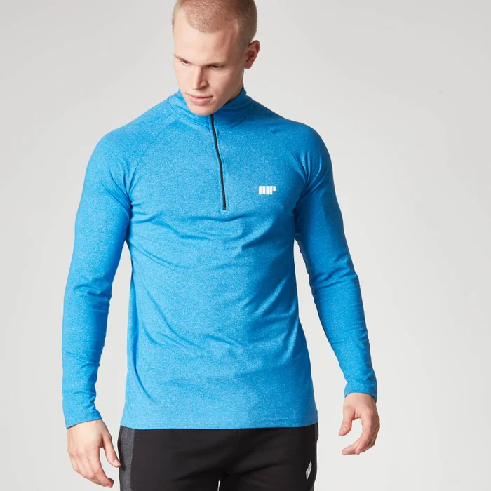 Haut performance zip 1/4 manches longues