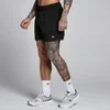 Short tissé MP Training 5" homme - Noir/Citron vert clair