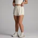 Short 2 en 1 fluide MP Tempo femme - Noix de coco